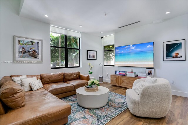 888 S Douglas Rd Unit 115, Coral Gables, FL 33134 - living room featuring wood finished floors and recessed lighting