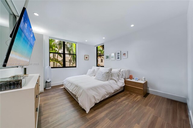 888 S Douglas Rd Unit 115, Coral Gables, FL 33134 - bedroom featuring wood finished floors and recessed lighting