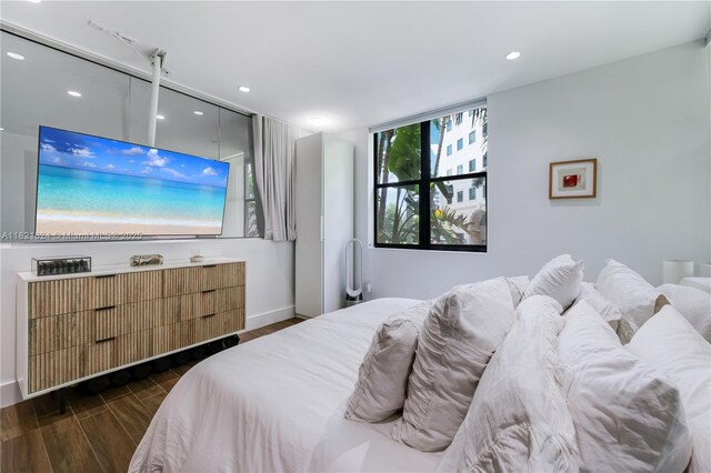 888 S Douglas Rd Unit 115, Coral Gables, FL 33134 - bedroom with wood finished floors and recessed lighting