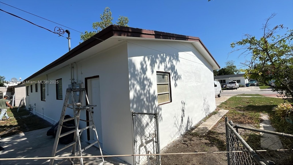 1301 NW 198th St, Miami Gardens, FL 33169 - view of home's exterior with stucco siding