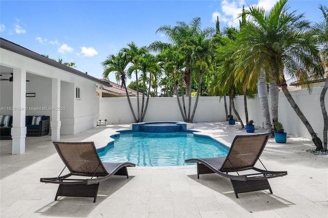 14288 SW 21st Ter, Miami, FL 33175 - view of pool featuring a fenced backyard, a patio, and a pool with connected hot tub