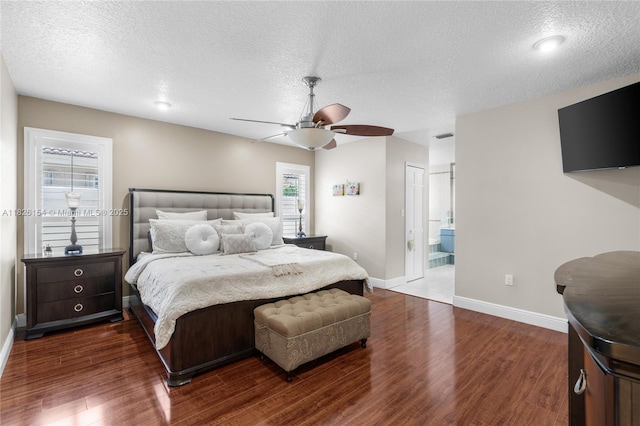 14288 SW 21st Ter, Miami, FL 33175 - bedroom featuring dark wood-style floors, a textured ceiling, ceiling fan, and connected bathroom