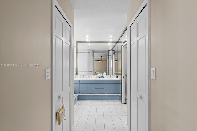 14288 SW 21st Ter, Miami, FL 33175 - bathroom with a closet, tile patterned floors, and double vanity