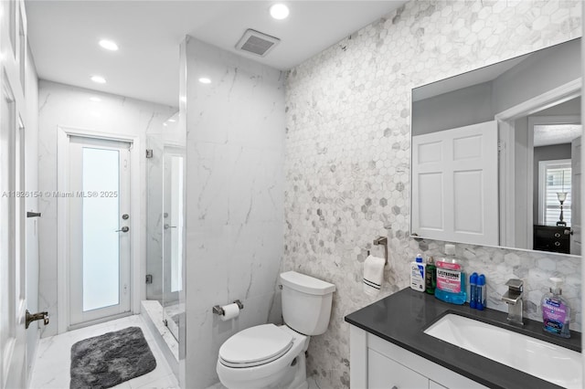 14288 SW 21st Ter, Miami, FL 33175 - bathroom with tile walls, vanity, a shower stall, recessed lighting, and backsplash