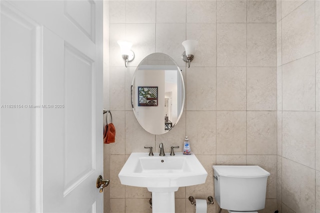 14288 SW 21st Ter, Miami, FL 33175 - half bathroom featuring tile walls and toilet