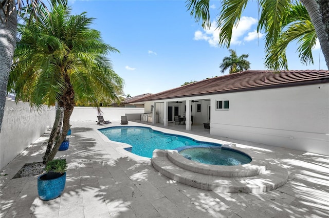 14288 SW 21st Ter, Miami, FL 33175 - view of pool with a ceiling fan, a fenced backyard, a patio area, and a pool with connected hot tub
