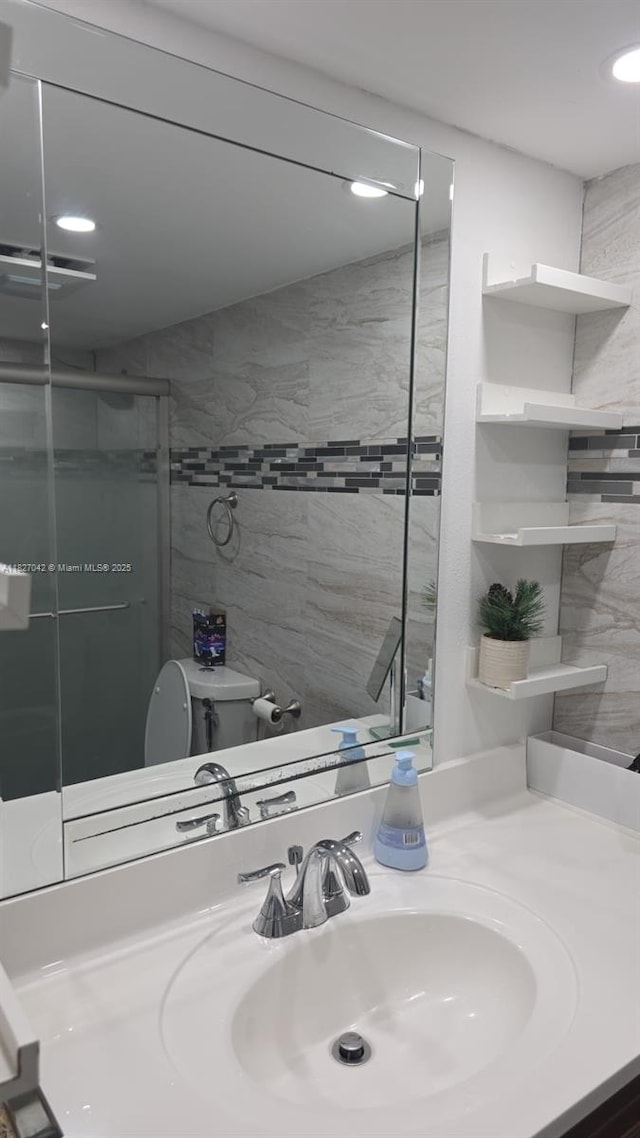 900 NE 12th Ave Unit 302, Hallandale Beach, FL 33009 - full bath with a stall shower, vanity, and recessed lighting