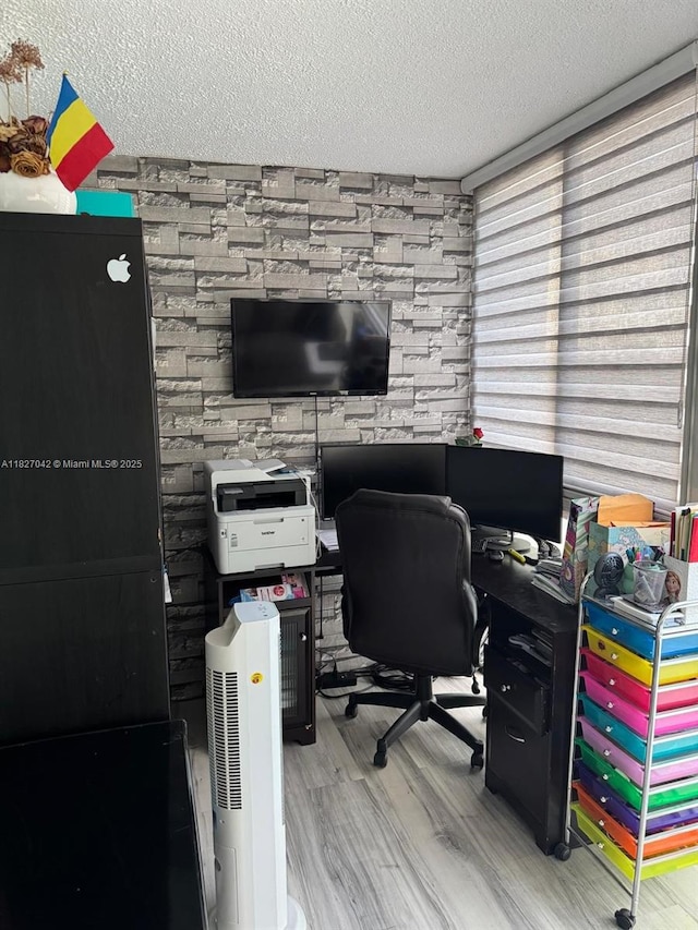 900 NE 12th Ave Unit 302, Hallandale Beach, FL 33009 - office area featuring a textured ceiling and wood finished floors