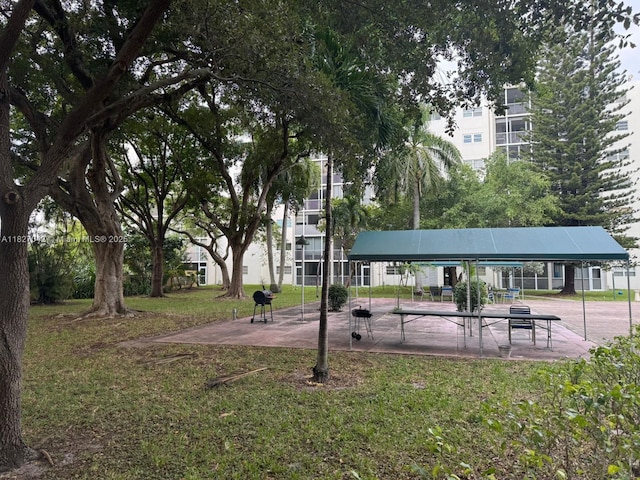 900 NE 12th Ave Unit 302, Hallandale Beach, FL 33009 - view of community with a yard
