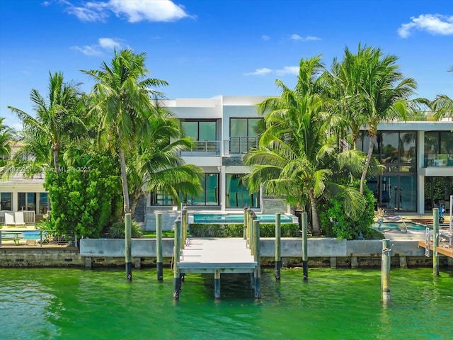 1311 Stillwater Dr, Miami Beach, FL 33141 - dock with a water view and a balcony