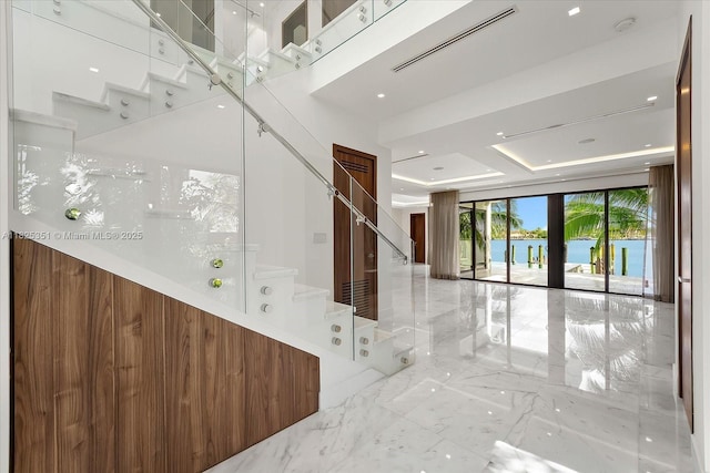 1311 Stillwater Dr, Miami Beach, FL 33141 - lobby with stairway and a water view