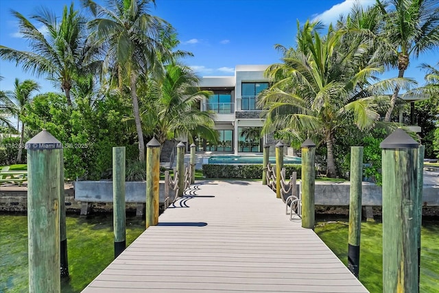 1311 Stillwater Dr, Miami Beach, FL 33141 - dock area featuring a balcony