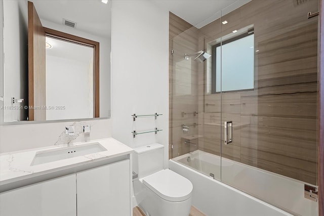 1311 Stillwater Dr, Miami Beach, FL 33141 - bathroom featuring vanity and bath / shower combo with glass door
