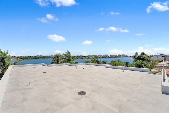 1311 Stillwater Dr, Miami Beach, FL 33141 - view of patio / terrace featuring a water view