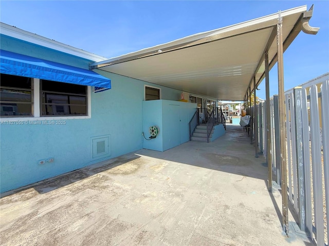 211 Banyan Ln, Tavernier, FL 33070 - view of parking / parking lot featuring a carport