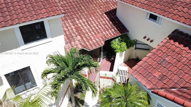 1105 San Remo Cir, Homestead, FL 33035 - exterior view of a tile roof and stucco siding