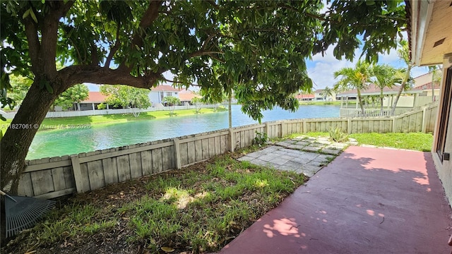 1105 San Remo Cir, Homestead, FL 33035 - fenced backyard featuring a water view and a patio