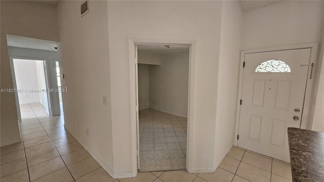 1105 San Remo Cir, Homestead, FL 33035 - entrance foyer featuring light tile patterned floors and baseboards