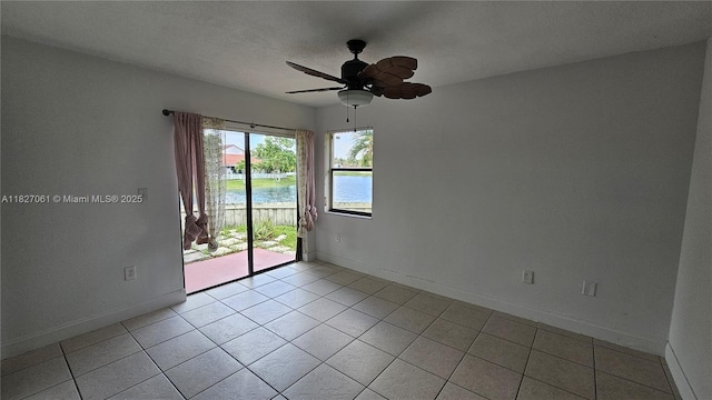 1105 San Remo Cir, Homestead, FL 33035 - spare room with ceiling fan and light tile patterned floors