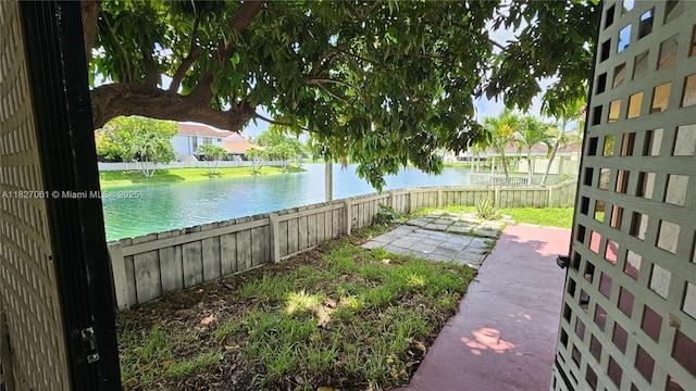 1105 San Remo Cir, Homestead, FL 33035 - view of yard with a water view and a patio