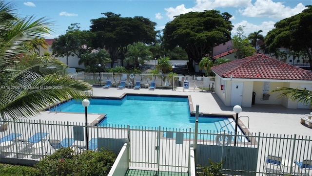 1105 San Remo Cir, Homestead, FL 33035 - community pool with a patio area