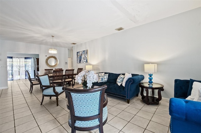 13011 SW 143rd Ter, Miami, FL 33186 - living area with light tile patterned floors and baseboards