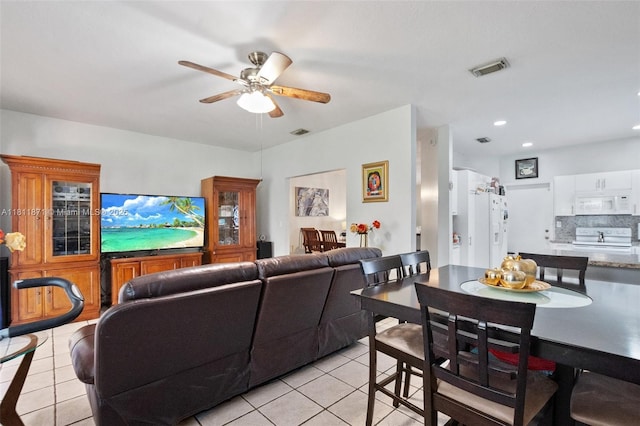 13011 SW 143rd Ter, Miami, FL 33186 - living room with light tile patterned floors, a ceiling fan, and recessed lighting