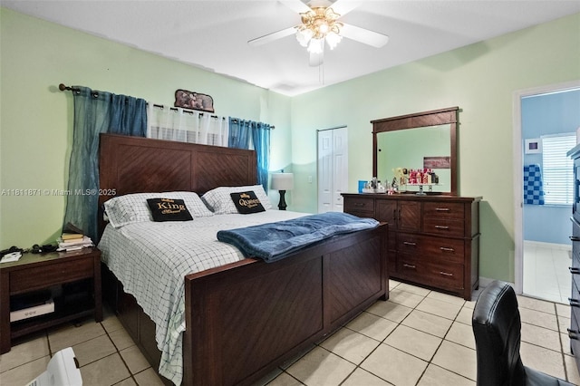 13011 SW 143rd Ter, Miami, FL 33186 - bedroom featuring light tile patterned floors, ceiling fan, and a closet