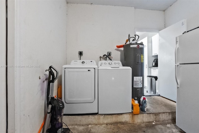 13011 SW 143rd Ter, Miami, FL 33186 - laundry area featuring electric water heater and washing machine and dryer