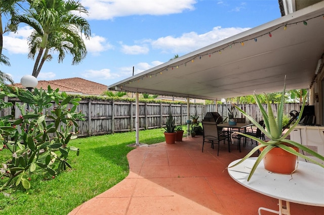 13011 SW 143rd Ter, Miami, FL 33186 - fenced backyard with a patio area and outdoor dining area