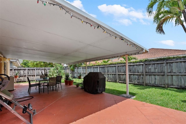 13011 SW 143rd Ter, Miami, FL 33186 - fenced backyard featuring a grill, outdoor dining area, and a patio area