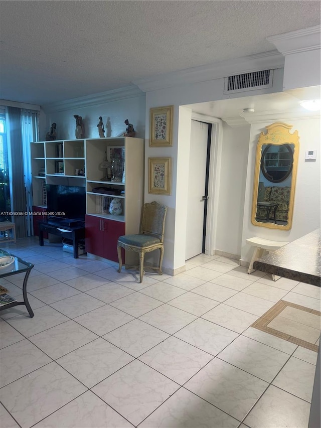 8821 W Flagler St Unit 108, Miami, FL 33174 - living room with a textured ceiling, ornamental molding, and light tile patterned floors