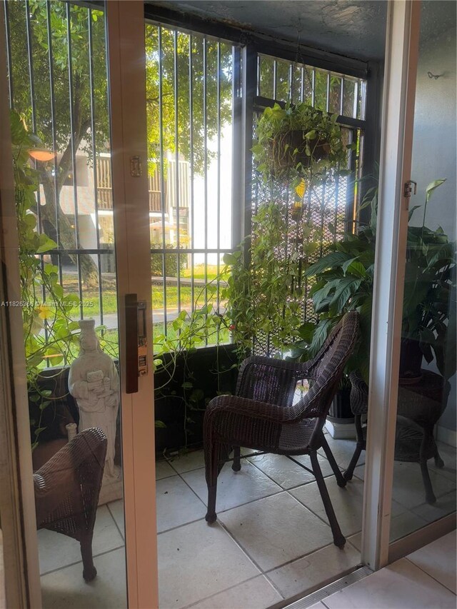 8821 W Flagler St Unit 108, Miami, FL 33174 - sunroom with healthy amount of natural light