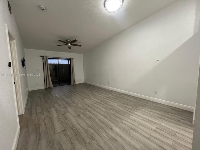 1710 NW 92nd Ave, Pembroke Pines, FL 33024 - spare room featuring a ceiling fan and wood finished floors