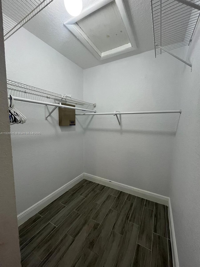 1710 NW 92nd Ave, Pembroke Pines, FL 33024 - walk in closet featuring wood finish floors