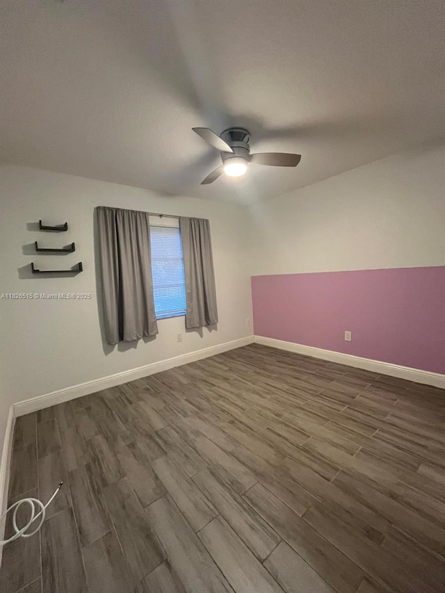 1710 NW 92nd Ave, Pembroke Pines, FL 33024 - empty room featuring dark wood-style floors and a ceiling fan