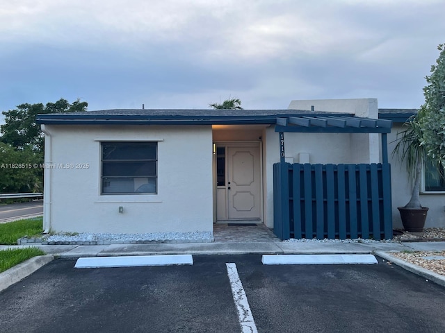 1710 NW 92nd Ave, Pembroke Pines, FL 33024 - bungalow featuring stucco siding and uncovered parking