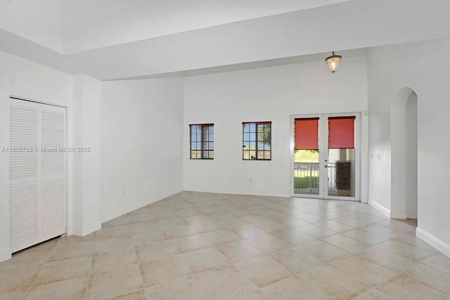 32157 SW 207th Ave, Homestead, FL 33030 - unfurnished room featuring arched walkways and light tile patterned floors