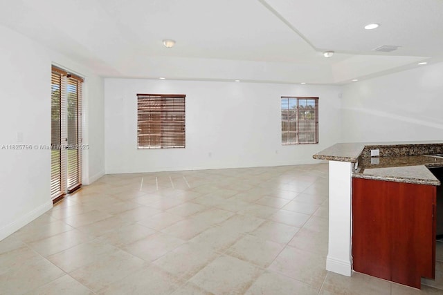 32157 SW 207th Ave, Homestead, FL 33030 - unfurnished room featuring healthy amount of natural light, recessed lighting, a tray ceiling, and light tile patterned floors
