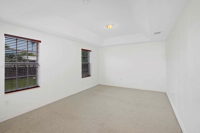 32157 SW 207th Ave, Homestead, FL 33030 - unfurnished room with healthy amount of natural light, light carpet, and a tray ceiling