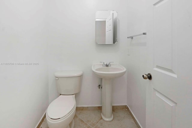 32157 SW 207th Ave, Homestead, FL 33030 - bathroom featuring toilet and tile patterned floors