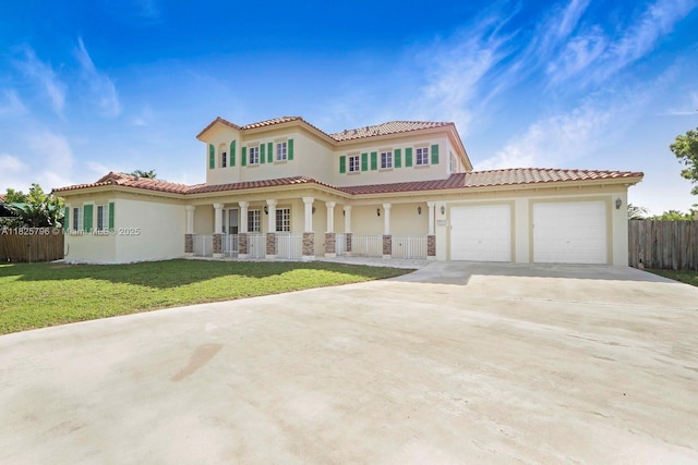 32157 SW 207th Ave, Homestead, FL 33030 - mediterranean / spanish-style house with a porch, concrete driveway, an attached garage, and stucco siding