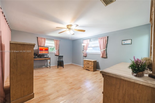 5103 NW 54th Ct, Tamarac, FL 33319 - home office with ceiling fan and light wood-type flooring