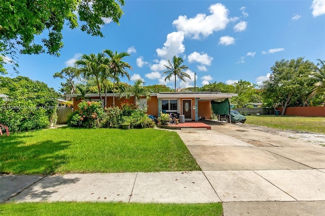 1616 SW 9th St, Fort Lauderdale, FL 33312 - single story home featuring driveway, covered porch, and a carport