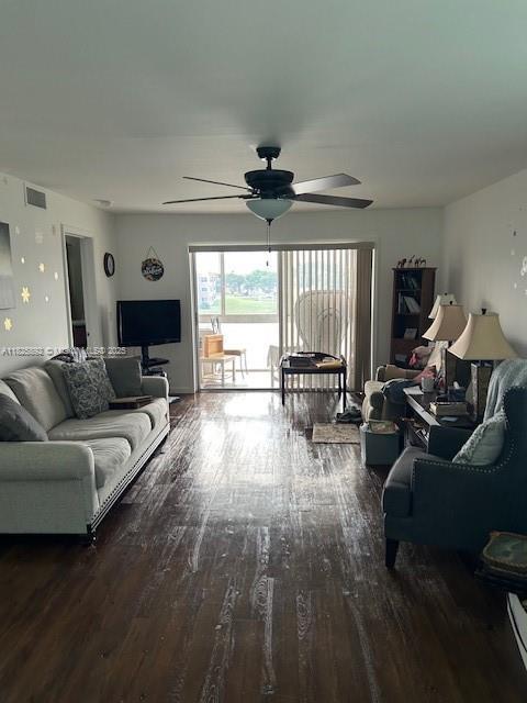 9841 Sunrise Lakes Blvd Unit 310, Sunrise, FL 33322 - living room with wood finished floors and a ceiling fan