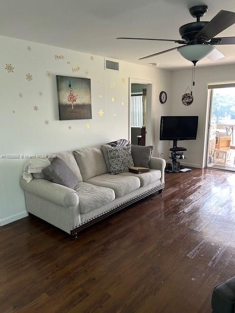 9841 Sunrise Lakes Blvd Unit 310, Sunrise, FL 33322 - living area featuring ceiling fan and wood finished floors