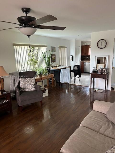 9841 Sunrise Lakes Blvd Unit 310, Sunrise, FL 33322 - living area featuring ceiling fan and light wood-type flooring