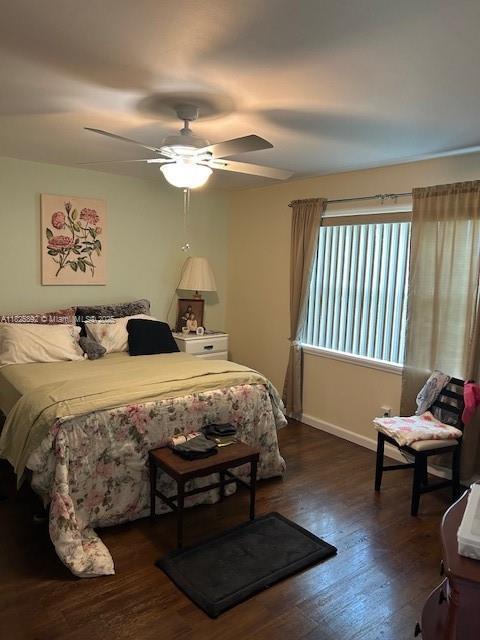9841 Sunrise Lakes Blvd Unit 310, Sunrise, FL 33322 - bedroom with hardwood / wood-style floors and a ceiling fan
