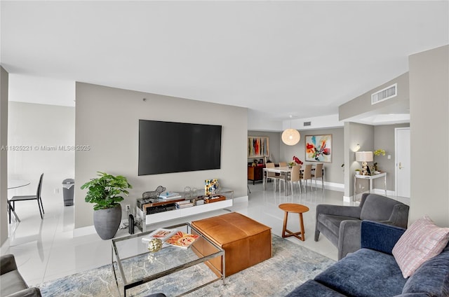 7000 Island Blvd Unit 1408, Aventura, FL 33160 - living room with tile patterned flooring and baseboards