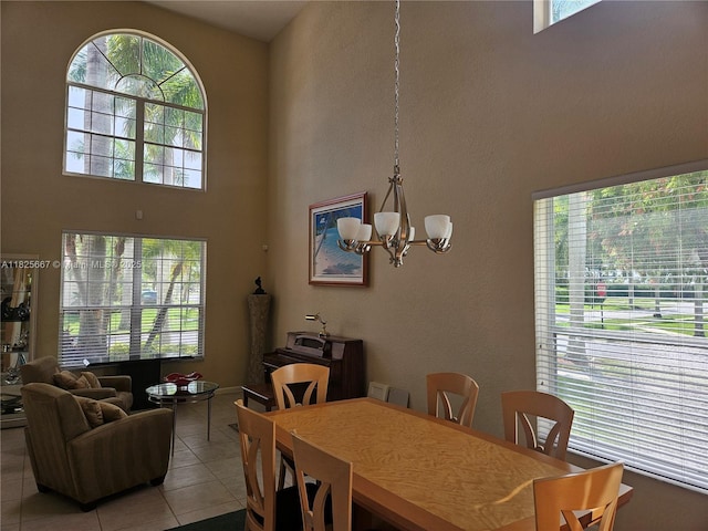 21300 Waycross Dr, Boca Raton, FL 33428 - dining room with light tile patterned floors, a chandelier, and a high ceiling